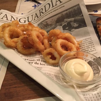 La Marineta - Fried calamari on newspaper - Mediterranean Near Me - Mataró, B