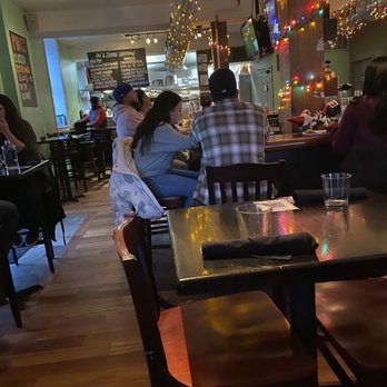 Sancho Pistola's - people sitting at tables in a restaurant - Mexican Near Me - Philadelphia, Pennsylvania
