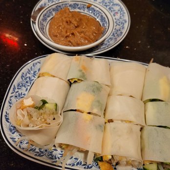 Sahla Thai - a plate of food and a bowl of dipping sauce - Thai Near Me - St Catharines, Ontario