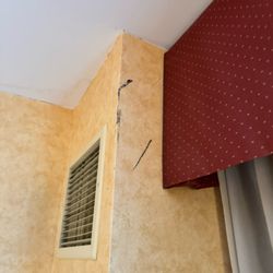 Radisson Hotel Santa Maria - The wallpaper falling off the wall from the mold and the leak. The smell was ungodly.