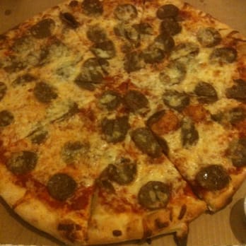 More Home Slice Pizza - The large pizza with extra cheese and sausage...yum! - Pizza Near Me - Austin, Texas More Home Slice Pizza - The large pizza with extra cheese and sausage...yum! - Pizza Near Me - Austin, Texas