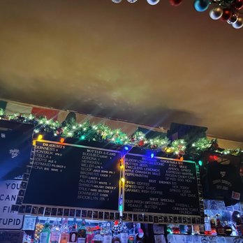 Biddy's Pub - christmas decorations on the wall - Pubs Near Me - New York, New York