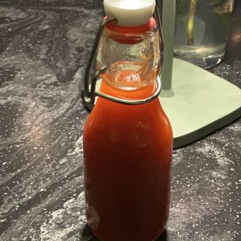 AT Bistro - Au Troisieme - Their aged hot sauce - New American Near Me - Dallas, Texas