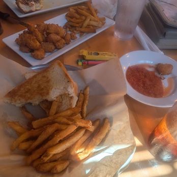Thirsty Moose Taphouse - Dover - A grilled cheese with a side of fries, along with fried curds and marinara sauce. - American Near Me - Dover, New Hampshire Thirsty Moose Taphouse - Dover - A grilled cheese with a side of fries, along with fried curds and marinara sauce. - American Near Me - Dover, New Hampshire