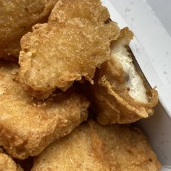 McDonald's - Hair and half eaten chicken nugget.