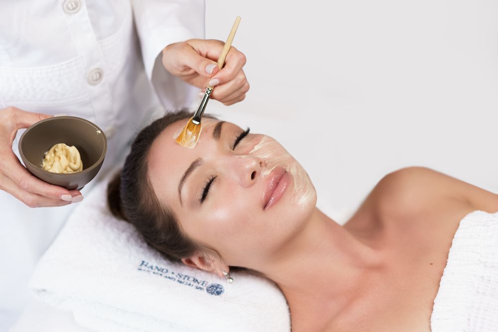 Hand & Stone Massage and Facial Spa Logo