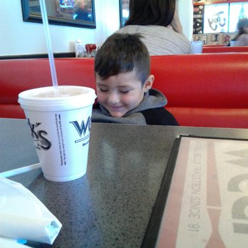 Weck's - Playing his tablet - Breakfast & Brunch Near Me - Los Lunas, New Mexico