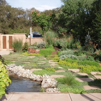 Bosque Natural - a garden with a pond and stone steps - Irrigation Near Me - Santa Fe, New Mexico Bosque Natural - a garden with a pond and stone steps - Irrigation Near Me - Santa Fe, New Mexico