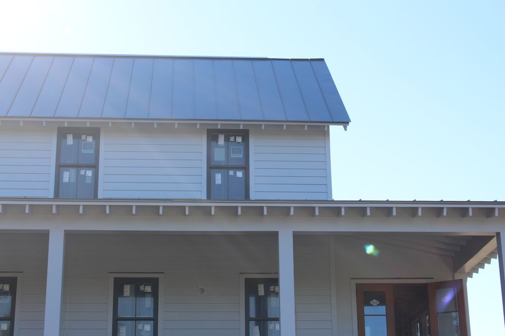 Slide of Canaan roofing and gutters