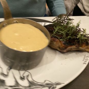 Wye Oak Tavern - Pork chop with cheesy grits - Bars Near Me - Frederick, Maryland Wye Oak Tavern - Pork chop with cheesy grits - Bars Near Me - Frederick, Maryland