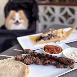 Carne Asada w/ skirt steak, tamari stewed tomatoes, cotija, tortillas ($22)