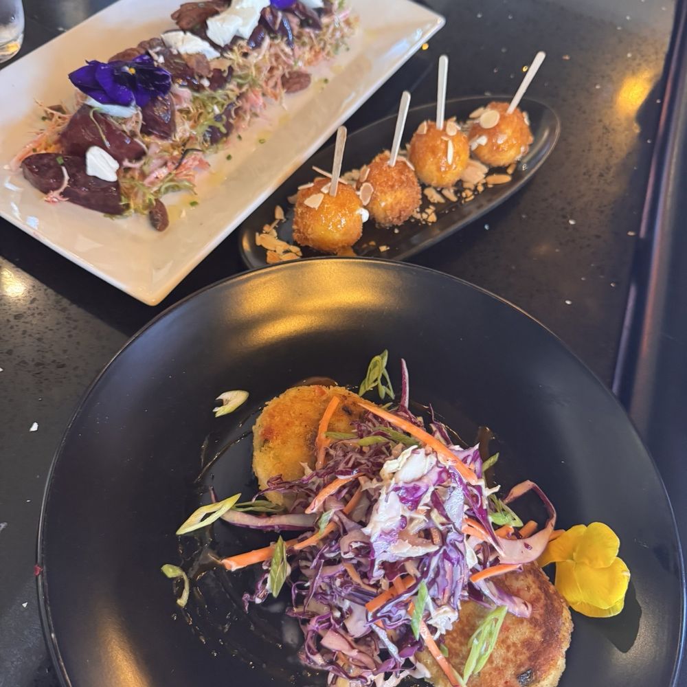 Beet salad, crab cakes and goat cheese lollipops