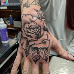 Lucid Arts Tattoo Studio - Rose on Hand