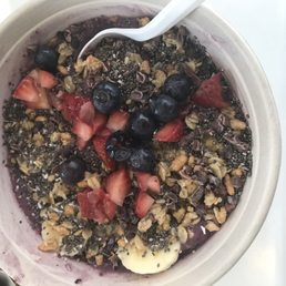 Barely a full strawberry, a couple blueberries, 3 slices of banana. For $11 being their cheapest bowl. Barely a full strawberry, a couple blueberries, 3 slices of banana. For $11 being their cheapest bowl.