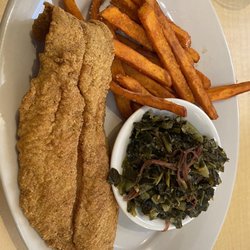 Cajun fried catfish with collard greens and sweet potatoe fries