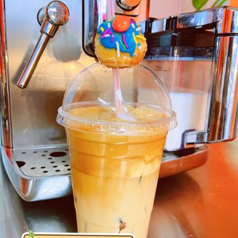 Franz Donuts - a cup of iced coffee with a donut on top - Donuts Near Me - Katy, Texas