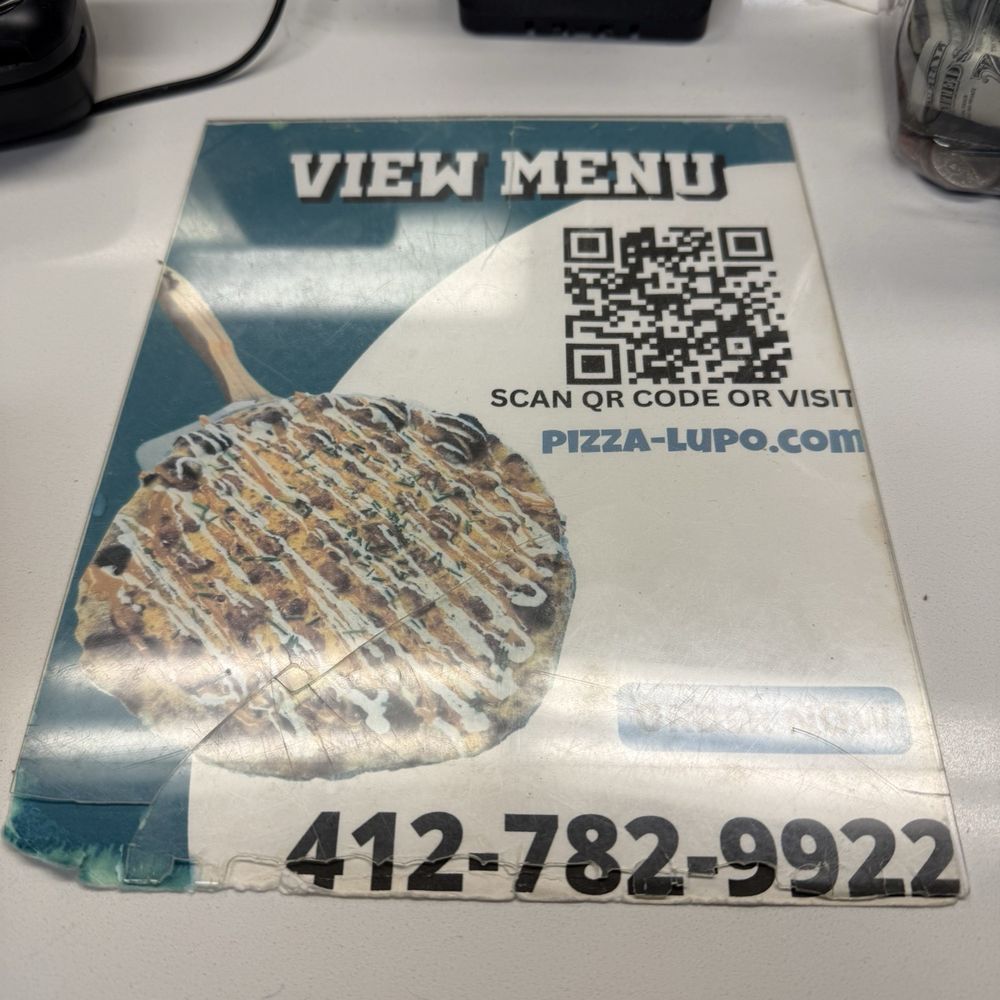 Pizza Lupo - Menu with QR code on front counter. - Pizza Near Me - Pittsburgh, Pennsylvania Pizza Lupo - Menu with QR code on front counter. - Pizza Near Me - Pittsburgh, Pennsylvania