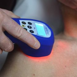 Lymphedema Specialists - Cold Laser application to front of shoulder