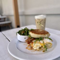 The Grove Cafe & Market - Breakfast sandwich ($11) with iced coffee