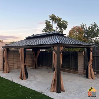 Top Builderz - Fixed and installed 12x20 Gazebo (metal) by Top Builderz - Handyman Near Me Top Builderz - Fixed and installed 12x20 Gazebo (metal) by Top Builderz - Handyman Near Me