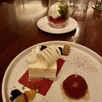 Scarpetta - Lemon and White Chocolate Semifreddo and Market Strawberries with basil granita and cream. - Italian Near Me - New York, New York Scarpetta - Lemon and White Chocolate Semifreddo and Market Strawberries with basil granita and cream. - Italian Near Me - New York, New York