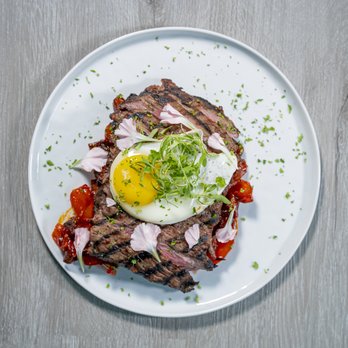 101 Kitchen - a plate of steak with an egg on top - Breakfast & Brunch Near Me - Knightdale, North Carolina 101 Kitchen - a plate of steak with an egg on top - Breakfast & Brunch Near Me - Knightdale, North Carolina
