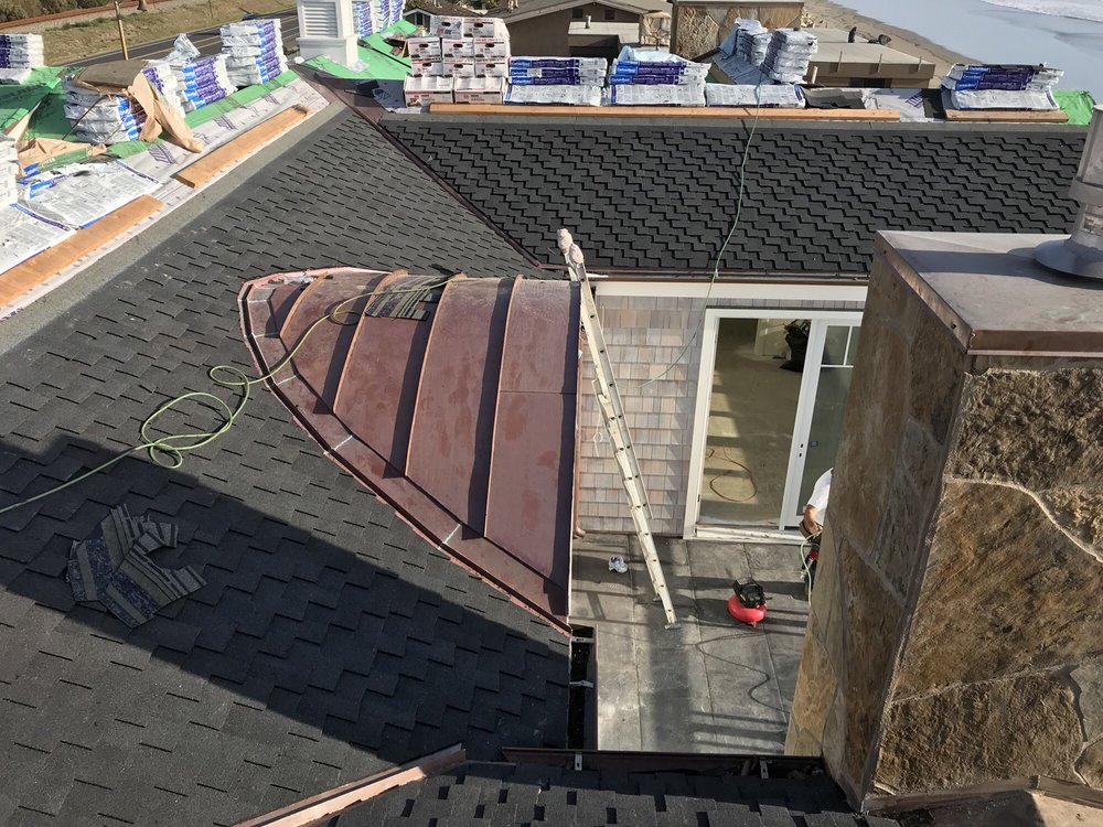 Slide of Aztec Roofing