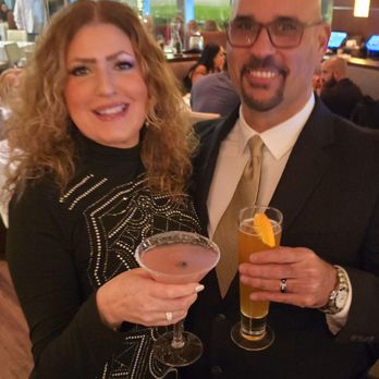 Fleming’s Prime Steakhouse & Wine Bar - Enjoying drinks at the bar before dinner - Wine Bars Near Me - Plano, Texas Fleming’s Prime Steakhouse & Wine Bar - Enjoying drinks at the bar before dinner - Wine Bars Near Me - Plano, Texas