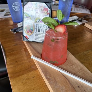 Wunsche Bros Cafe & Saloon - Tipsy Tulip drink with strawberries and watermelon. - Burgers Near Me - Spring, Texas