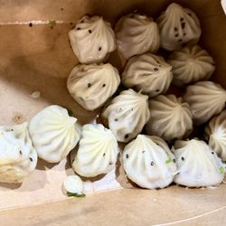 Thumb-sized pan fried pork buns