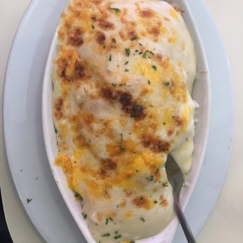 Maxim's Restaurant - Baked cod fish ( there is veg fried rice n egg underneath that cheese coated fish) - Bakeries Near Me - Vancouver, British Columbia