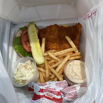 The Mucky Duck - Grouper sandwich, fries, coleslaw, special sauce. - Seafood Near Me - Captiva, Florida The Mucky Duck - Grouper sandwich, fries, coleslaw, special sauce. - Seafood Near Me - Captiva, Florida