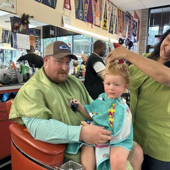 Times Barber Shop - My Tia Christina giving this young gentleman his First big boy hair cut at Times barber shop. - Barbers Near Me - Houston, Texas Times Barber Shop - My Tia Christina giving this young gentleman his First big boy hair cut at Times barber shop. - Barbers Near Me - Houston, Texas