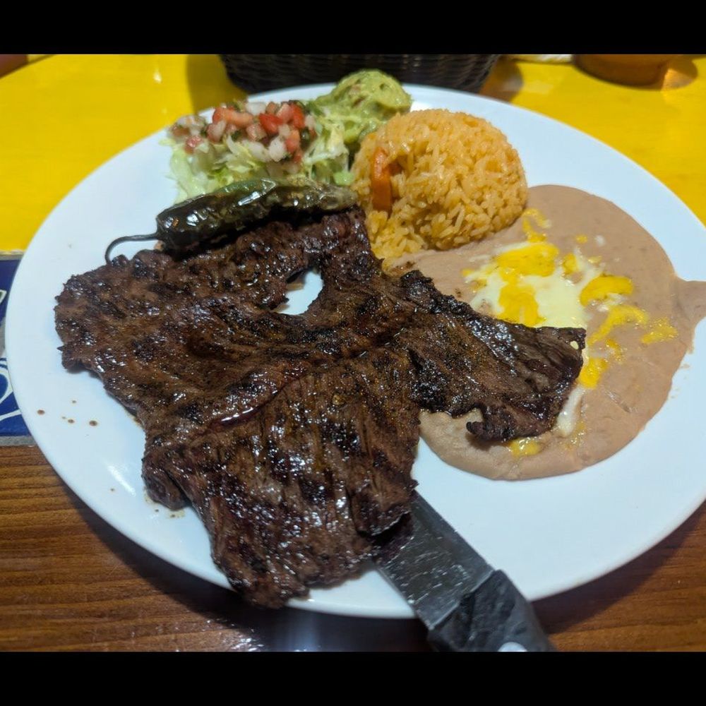 Carne Asada skirt steak with rice and beans. Carne Asada skirt steak with rice and beans.