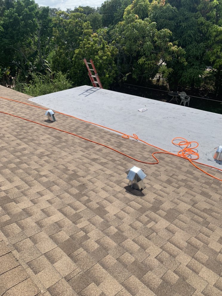 Slide of Louis Roofing