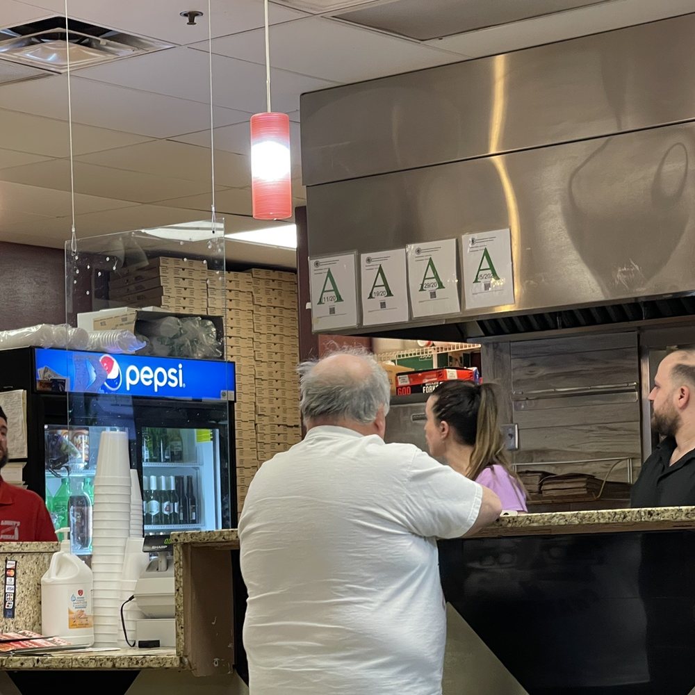 Lucky's Pizza - customers at the counter - Pizza Near Me - Surprise, Arizona Lucky's Pizza - customers at the counter - Pizza Near Me - Surprise, Arizona