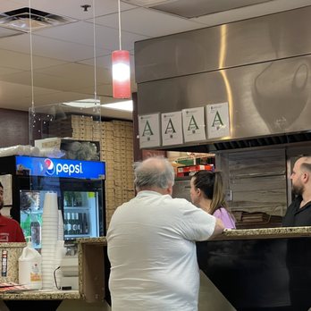 Lucky's Pizza - customers at the counter - Pizza Near Me - Surprise, Arizona Lucky's Pizza - customers at the counter - Pizza Near Me - Surprise, Arizona
