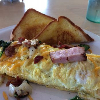 Huskers Cafe - Huskers Omelette with ham, bacon, mushrooms, spinach & onions with Texas toast- delicious! - Breakfast & Brunch Near Me - Stone Mountain, Georgia