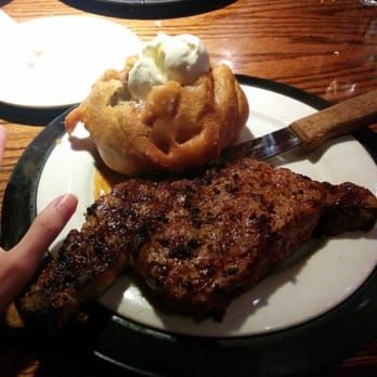 Ruby River Steakhouse - Rib eye and jacketed baked potato - Steakhouses Near Me - Salt Lake City, Utah