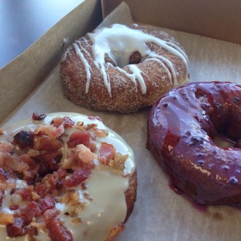 Duck Donuts - Bacon maple, cinnamon sugar vanilla drizzle, blueberry with raspberry drizzle. - Donuts Near Me - Fairfax, Virginia