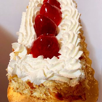 Safeway - a hand holding a piece of cake with whipped cream and cherries - Grocery Near Me - Prunedale, California Safeway - a hand holding a piece of cake with whipped cream and cherries - Grocery Near Me - Prunedale, California