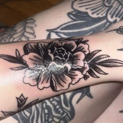 Euphoria Body Piercing & Tattoo - Flash tattoo from euphoria. Overworked black ink.