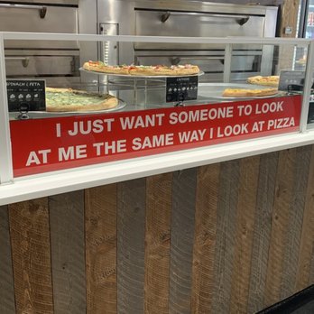Brick 3 Pizza - a pizza counter with a sign that says i just want someone to look at me the same way i look at pizza - Pizza Near Me - Milwaukee, Wisconsin