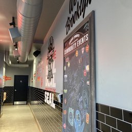 a chalkboard in a hallway a chalkboard in a hallway