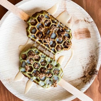 The Maple Reserve - Matcha gluten free waffle with white chocolate, fresh mango, & house made maple sesame brittle. - Coffee & Tea Near Me - Manchester, Vermont The Maple Reserve - Matcha gluten free waffle with white chocolate, fresh mango, & house made maple sesame brittle. - Coffee & Tea Near Me - Manchester, Vermont