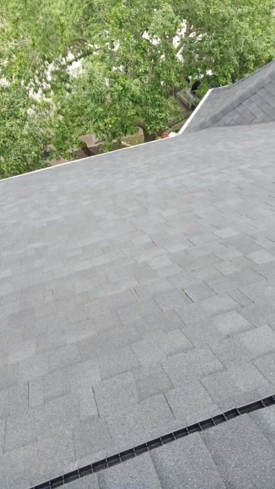 Slide of Refined Roofing & Construction