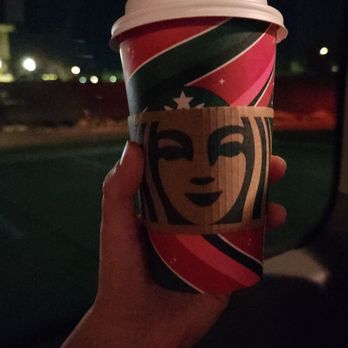 Starbucks - a hand holding a cup of coffee - Coffee & Tea Near Me - Plano, Texas Starbucks - a hand holding a cup of coffee - Coffee & Tea Near Me - Plano, Texas