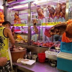 西貢街市 - Char sui pork vendor at the entrance of the wet market. The crispy pork is to die for!