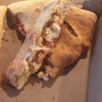 Paisano's Pizzeria - Chicken cutlet calzone with sauce and cheese - Pizza Near Me - Derry, New Hampshire Paisano's Pizzeria - Chicken cutlet calzone with sauce and cheese - Pizza Near Me - Derry, New Hampshire