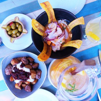 Xiringuito Escribà - Olives, Potatoes in Spicy Tomato Sauce, Sea Bass Ceviche & White Wine Sangria - Arroceria / Paella Near Me - Barcelona, B Xiringuito Escribà - Olives, Potatoes in Spicy Tomato Sauce, Sea Bass Ceviche & White Wine Sangria - Arroceria / Paella Near Me - Barcelona, B